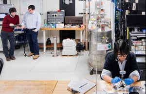 Scientist working in front of a quantum computer. 